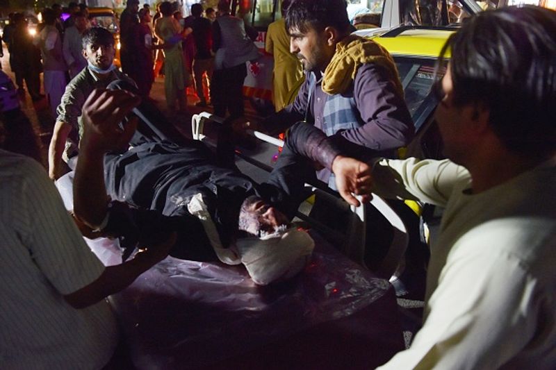 Kabul blast America will retaliate at the right place at the right time joe biden says