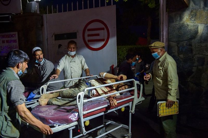Kabul blast America will retaliate at the right place at the right time joe biden says