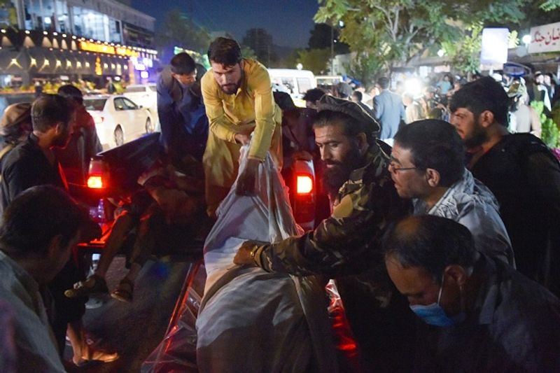 Kabul blast America will retaliate at the right place at the right time joe biden says