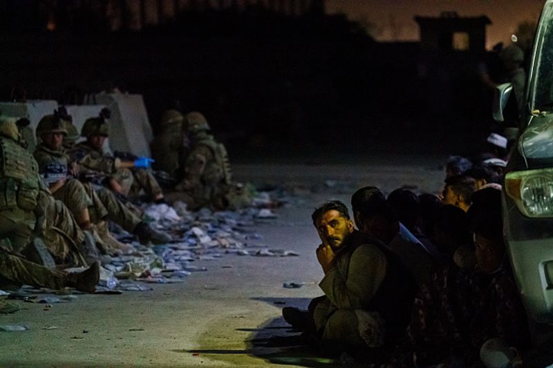 Kabul blast America will retaliate at the right place at the right time joe biden says