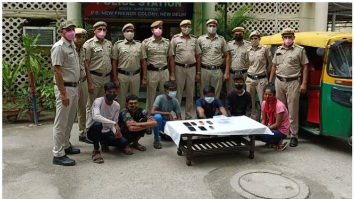 Tattooed on corpse's hand; Seven arrested for brutal murder, including wife and boyfriend