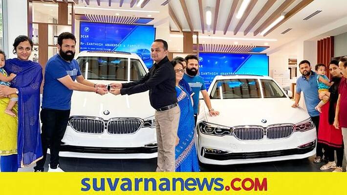 Kannada director Santhosh Ananddram welcome white BMW 520D car vcs Kannada director Santhosh Ananddram welcome white BMW 520D car vcs