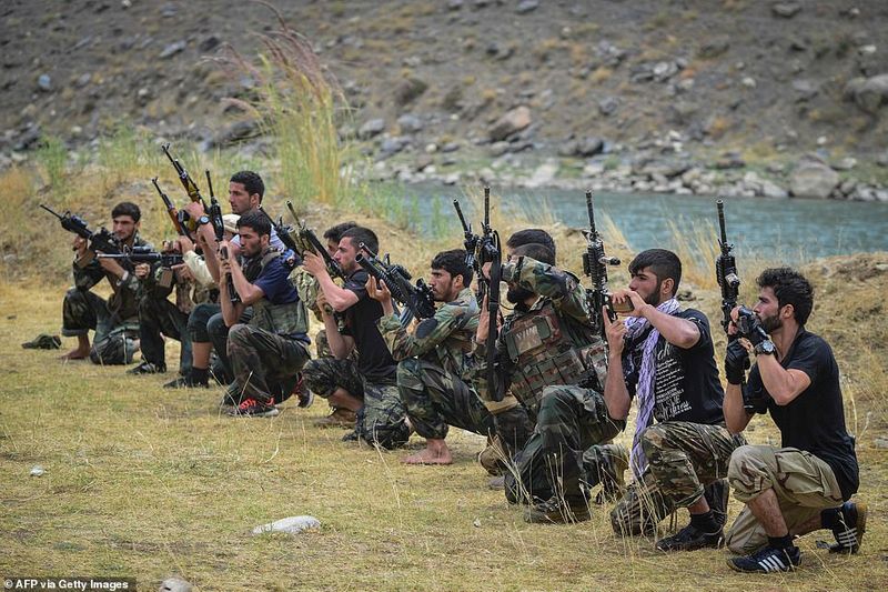 northern alliance forces train in the Afghan mountains agianst taliban