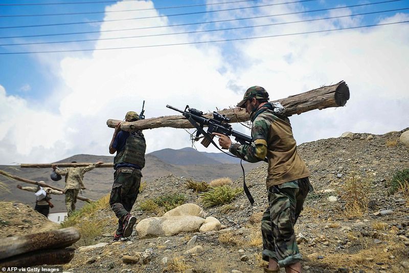 northern alliance forces train in the Afghan mountains agianst taliban