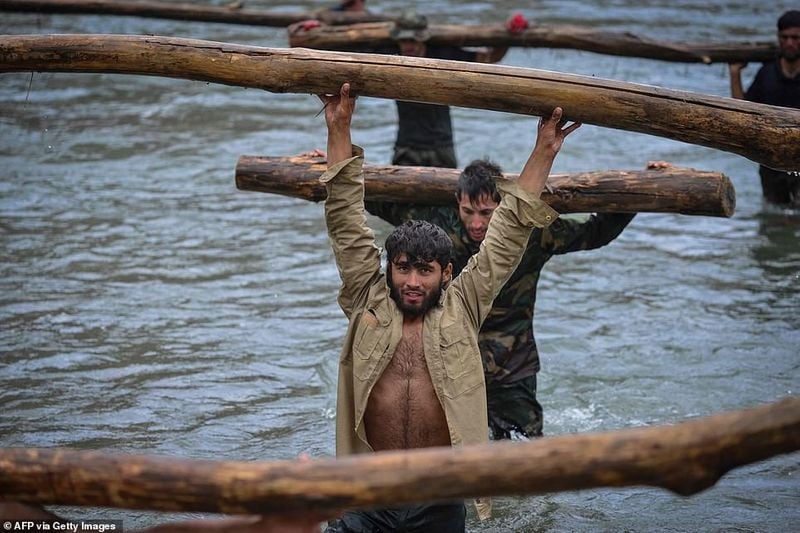 northern alliance forces train in the Afghan mountains agianst taliban