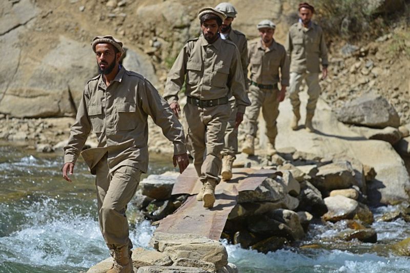 northern alliance forces train in the Afghan mountains agianst taliban