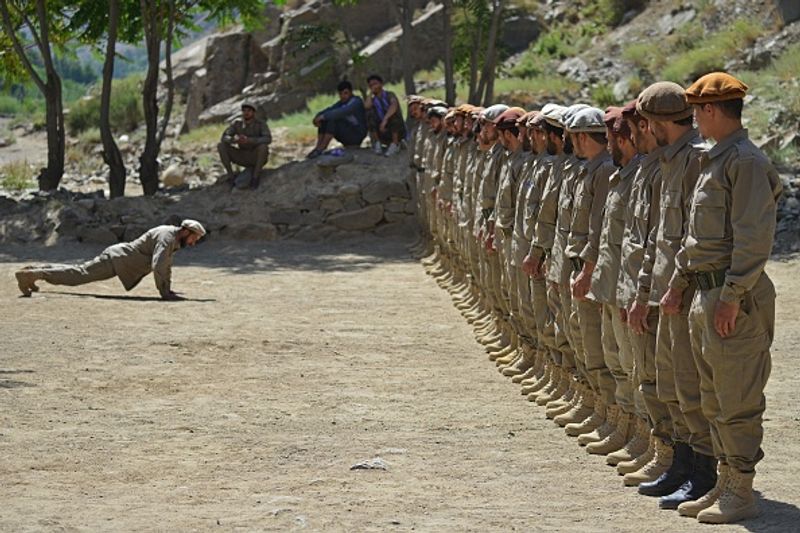 northern alliance forces train in the Afghan mountains agianst taliban