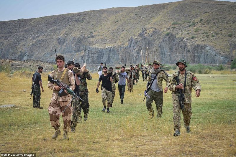 northern alliance forces train in the Afghan mountains agianst taliban