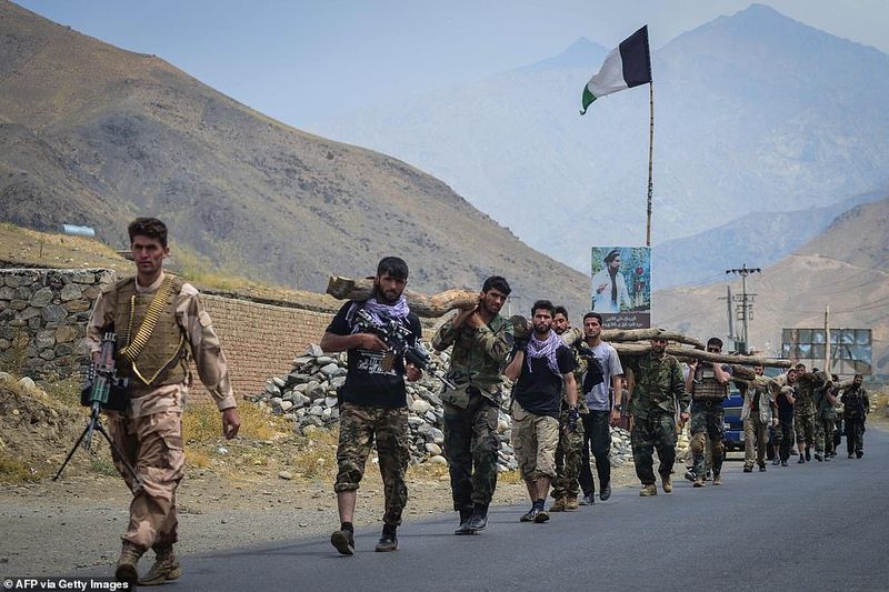 northern alliance forces train in the Afghan mountains agianst taliban