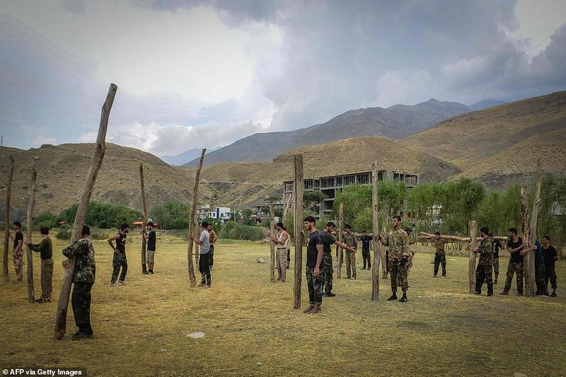 northern alliance forces train in the Afghan mountains agianst taliban