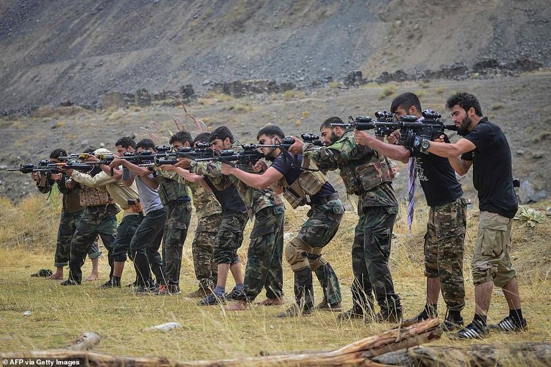 northern alliance forces train in the Afghan mountains agianst taliban