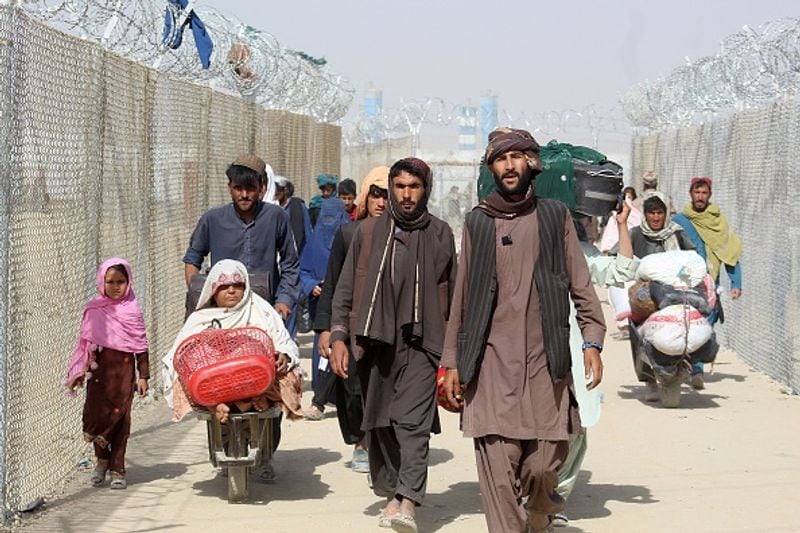 Afghanistan Refugees walking through the desert to Iran and Pakistan