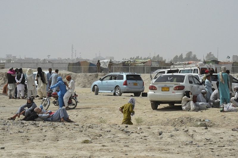 Taliban claim Afghan independence thousands of Afghans flee their homeland