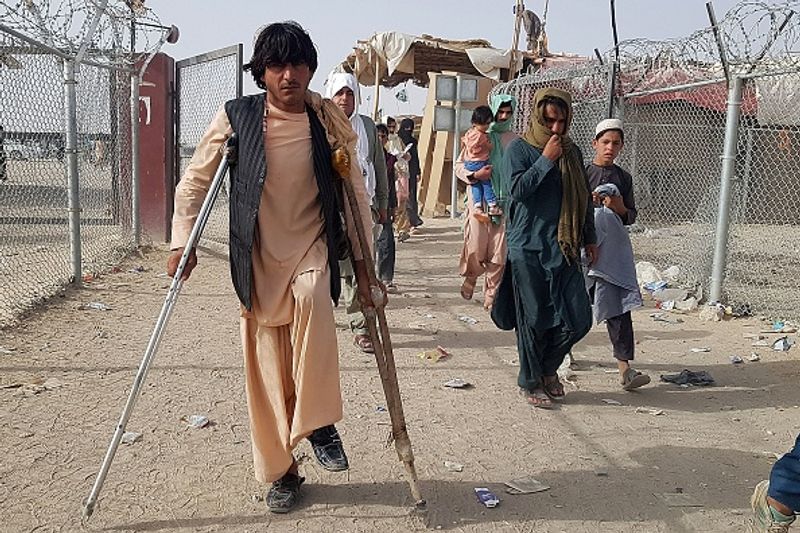Taliban claim Afghan independence thousands of Afghans flee their homeland