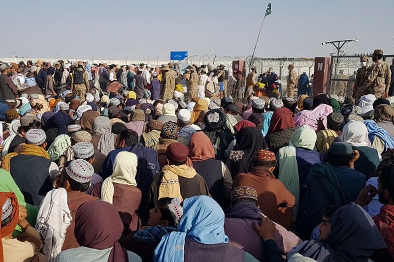 Taliban claim Afghan independence thousands of Afghans flee their homeland