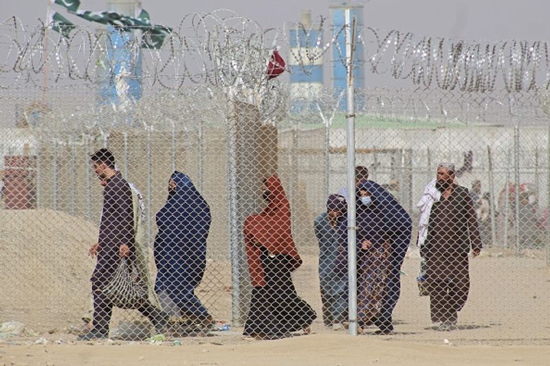 Taliban claim Afghan independence thousands of Afghans flee their homeland