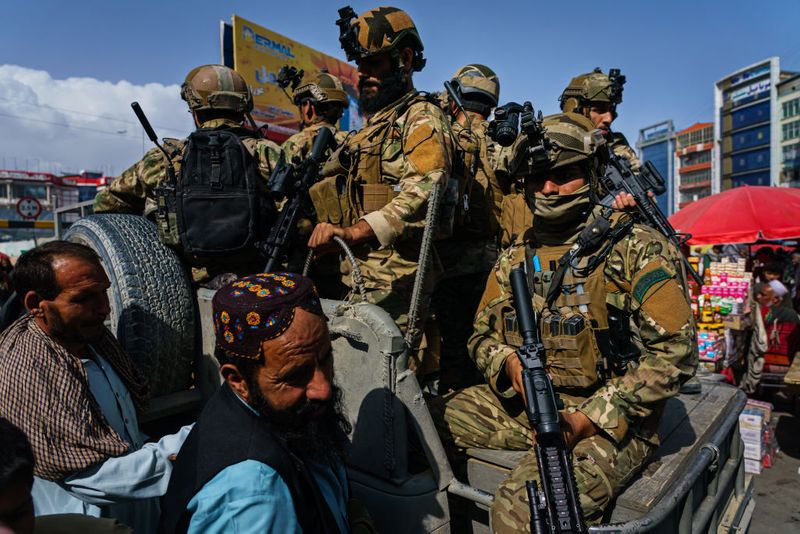 taliban parade to show off captured weapons as Afghanistan leads to humanitarian crisis