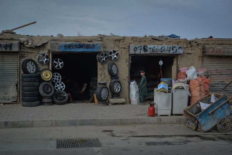 taliban parade to show off captured weapons as Afghanistan leads to humanitarian crisis