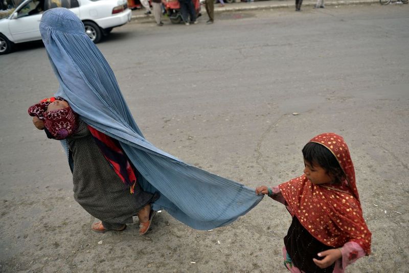 taliban parade to show off captured weapons as Afghanistan leads to humanitarian crisis