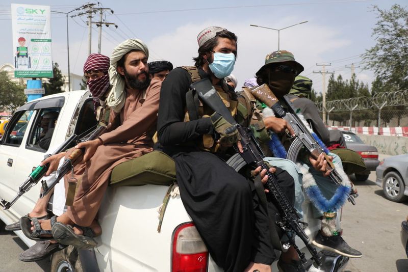 taliban parade to show off captured weapons as Afghanistan leads to humanitarian crisis