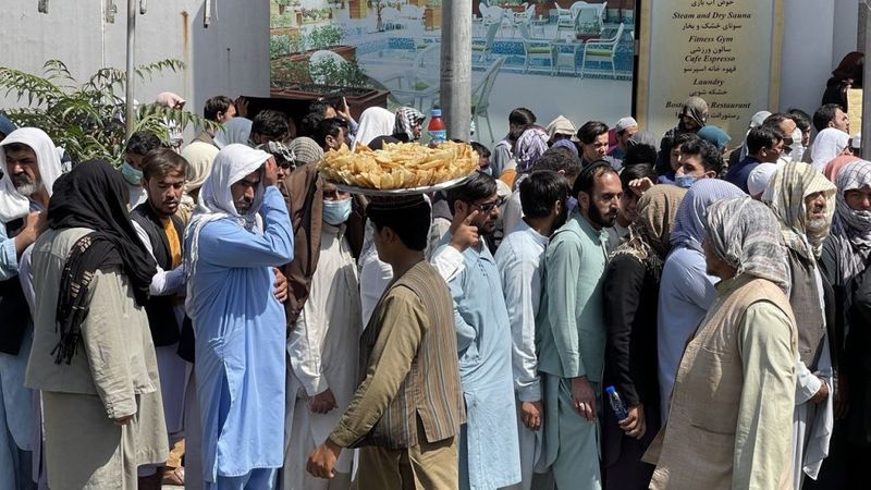 taliban parade to show off captured weapons as Afghanistan leads to humanitarian crisis