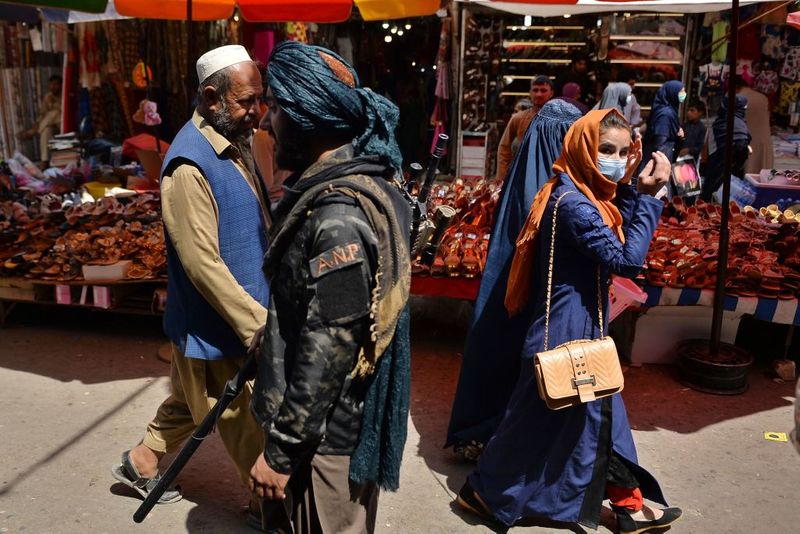 taliban parade to show off captured weapons as Afghanistan leads to humanitarian crisis