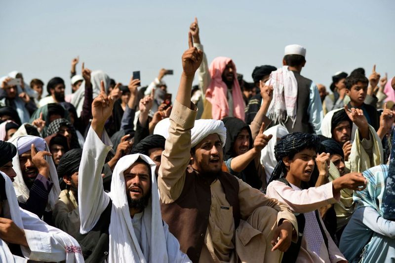 taliban parade to show off captured weapons as Afghanistan leads to humanitarian crisis
