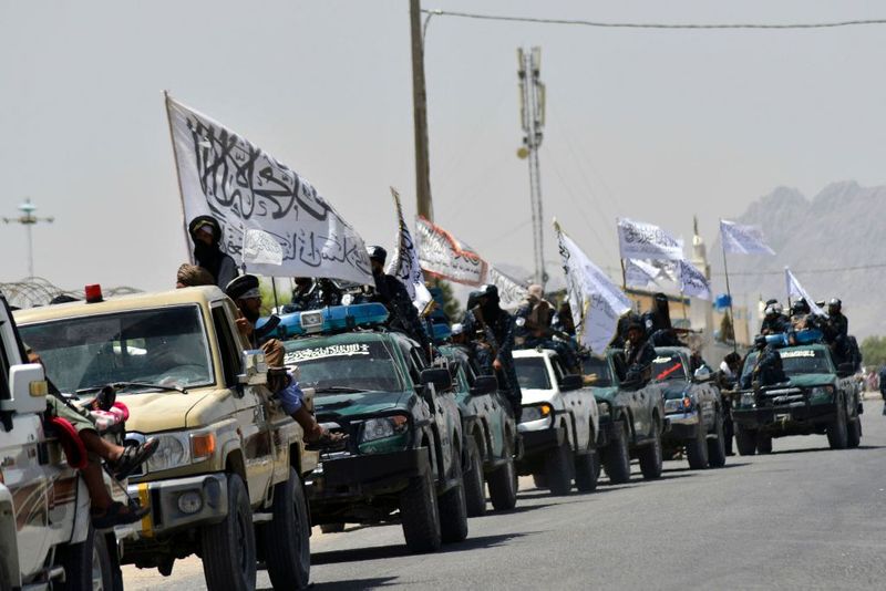 taliban parade to show off captured weapons as Afghanistan leads to humanitarian crisis