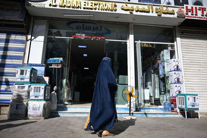 taliban parade to show off captured weapons as Afghanistan leads to humanitarian crisis