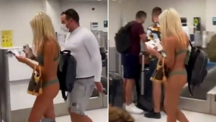 US woman walks through the airport in bikini and face mask; video goes viral-tgy US woman walks through the airport in bikini and face mask; video goes viral-tgy