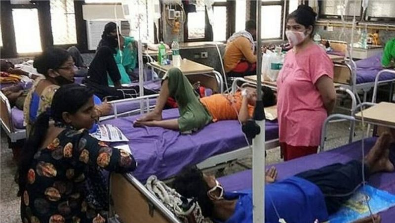 uttar pradesh mystery disease viral fever two children admitted to one bed in prayagraj hospital