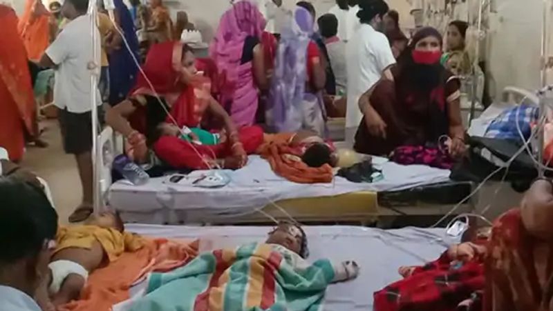 uttar pradesh mystery disease viral fever two children admitted to one bed in prayagraj hospital