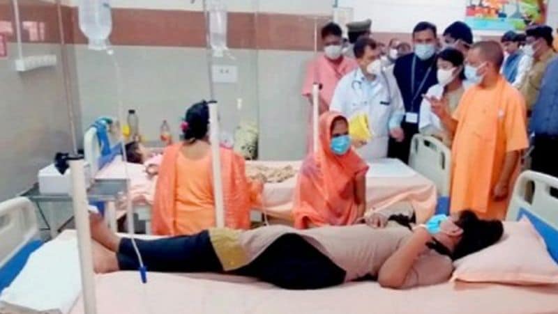 uttar pradesh mystery disease viral fever two children admitted to one bed in prayagraj hospital