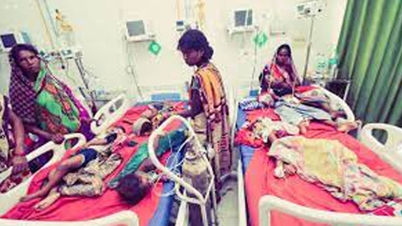 uttar pradesh mystery disease viral fever two children admitted to one bed in prayagraj hospital