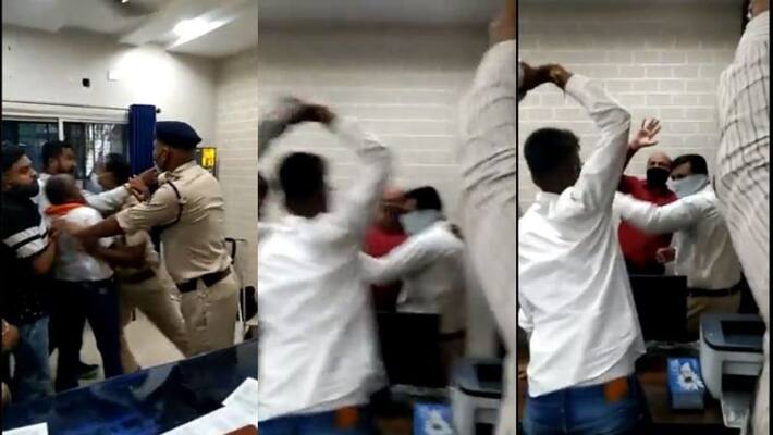 Christian priest was beaten up by a right-wing mob inside a police station in Raipur alleging religious conversions Christian priest was beaten up by a right-wing mob inside a police station in Raipur alleging religious conversions