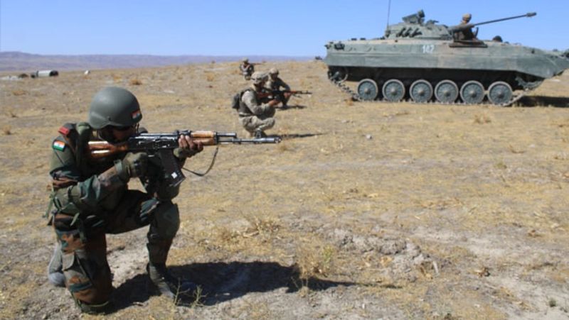 Troops of India and Kazakhstan carrying out the demonstration of a raid on a terrorist hideout during the joint military exercise