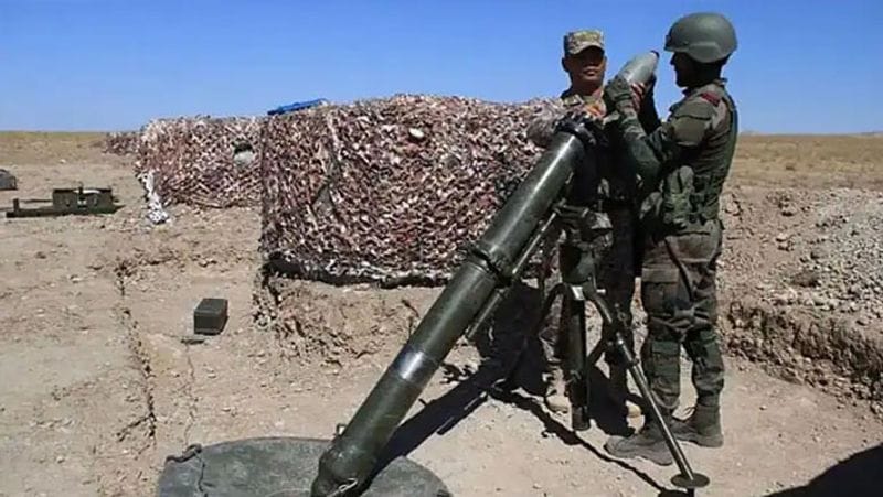 Troops of India and Kazakhstan carrying out the demonstration of a raid on a terrorist hideout during the joint military exercise