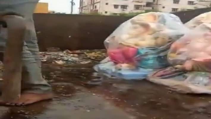 Lord Vinayaka idols thrown in Municipality Garbage Tractors in Guntur Lord Vinayaka idols thrown in Municipality Garbage Tractors in Guntur