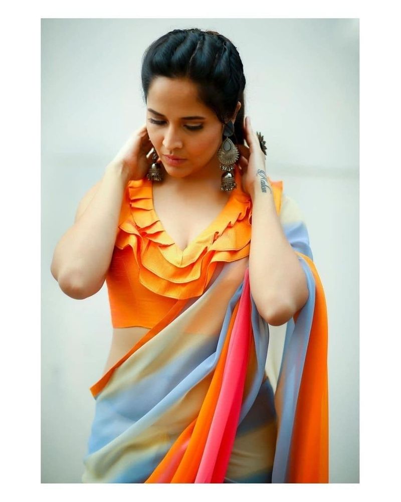 anchor anasuya shares sizzling collection of her saree wear she look damn glamorous