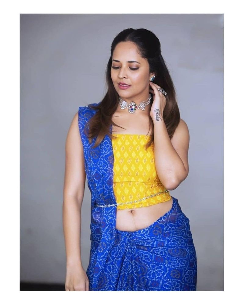 anchor anasuya shares sizzling collection of her saree wear she look damn glamorous