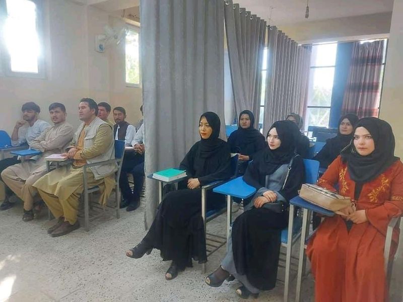 Private universities open in Afghanistan Curtain separating boys and girls in classroom