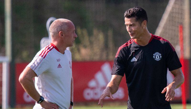 Cristiano Ronaldo arrives for Manchester United training in a rental car