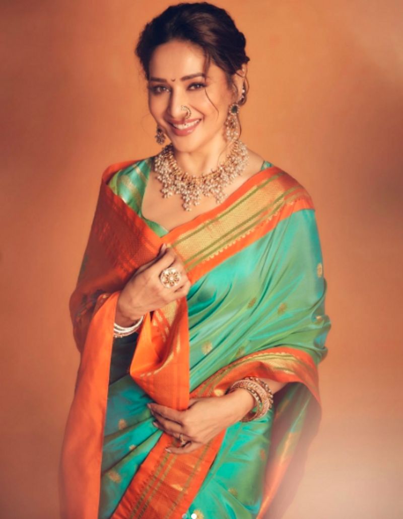 Bollywood actress Madhuri Dixit is elegance in a traditional Paithani saree worth Rs 35000 dpl