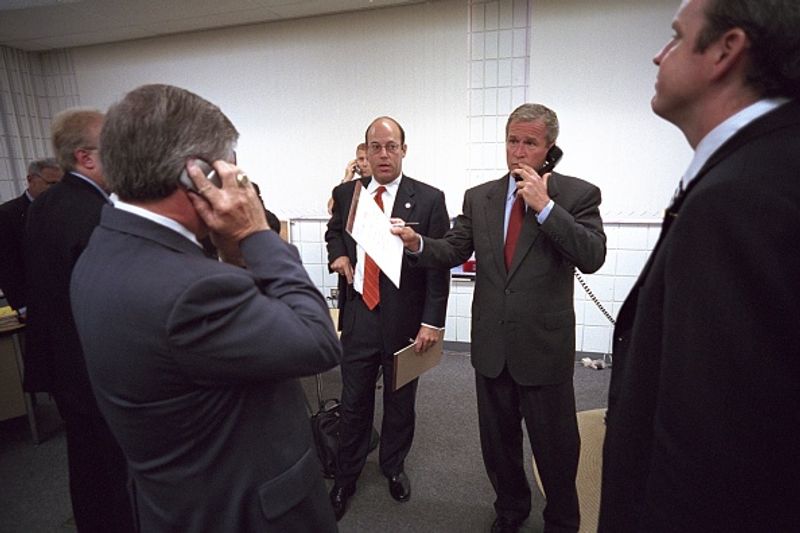 9 11 america terrorist attack news was given by Andrew Card to George W Bush