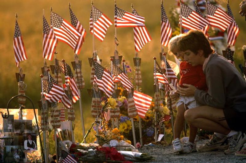 9 11 america terrorist attack news was given by Andrew Card to George W Bush