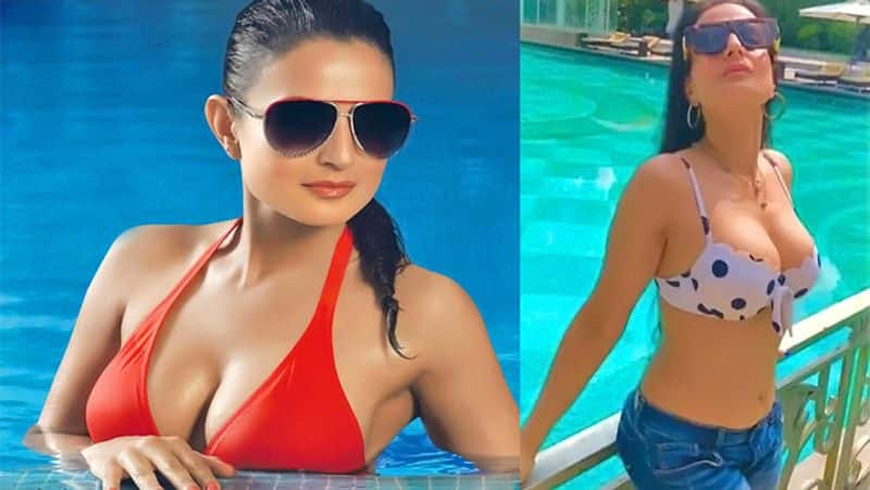  Amisha Patel goes Backless with her sexy and hot look in the sea beach of Bahrain  