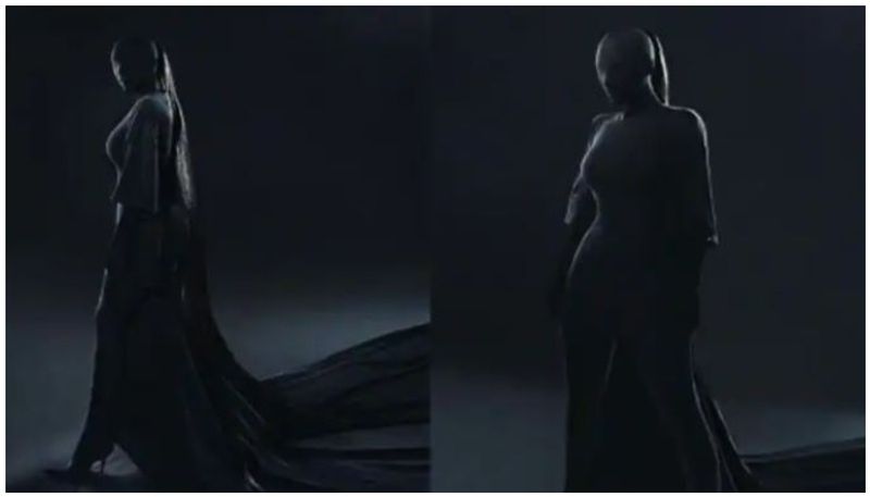 Kim Kardashian wore black outfit covering face to toe