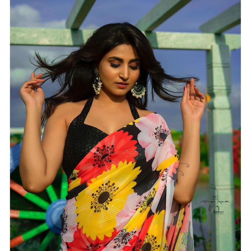 anchor varshini showing her real hotness and shared stunning photos