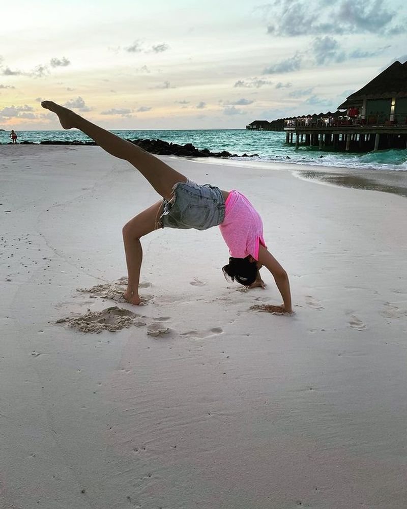 hansika enjoying cool weather at beach photos viral