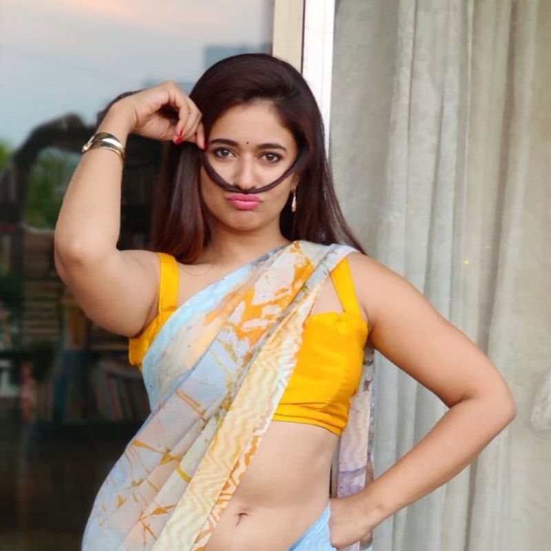 Boss Heroine Poonam Bajwa stunning saree look photos